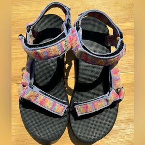 Teva Original Universal in “Iridescence Tangerine Multi.” Women’s size 7.